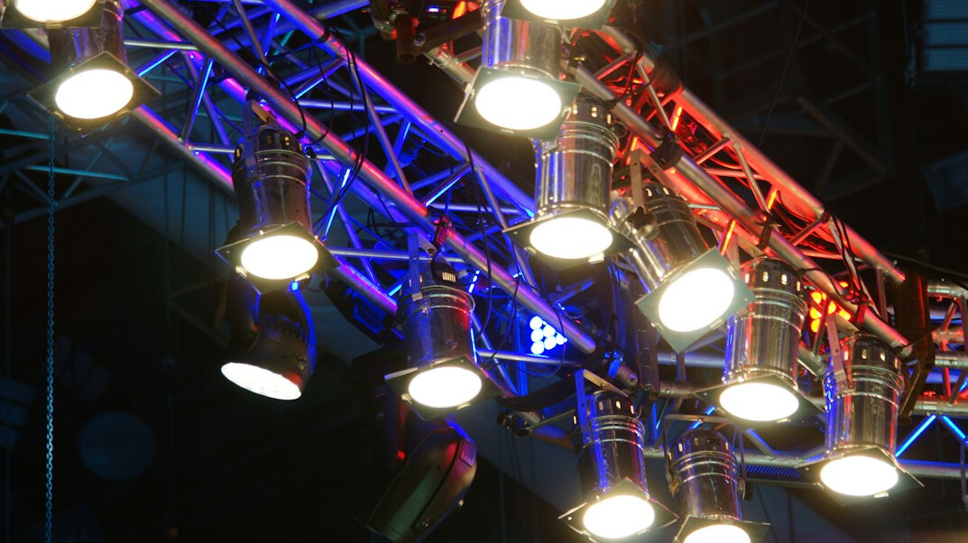 Television studio cameras and lighting rig ready for live broadcast